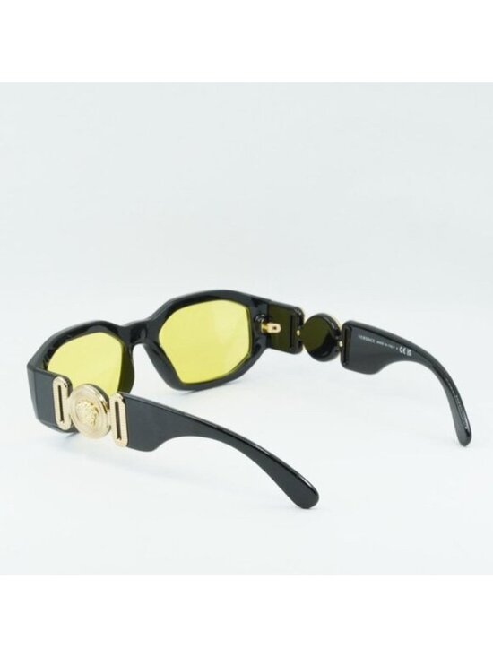 Versace VE4361 GB1/85 Sunglasses Solid Black Oval Frame, Yellow Lenses